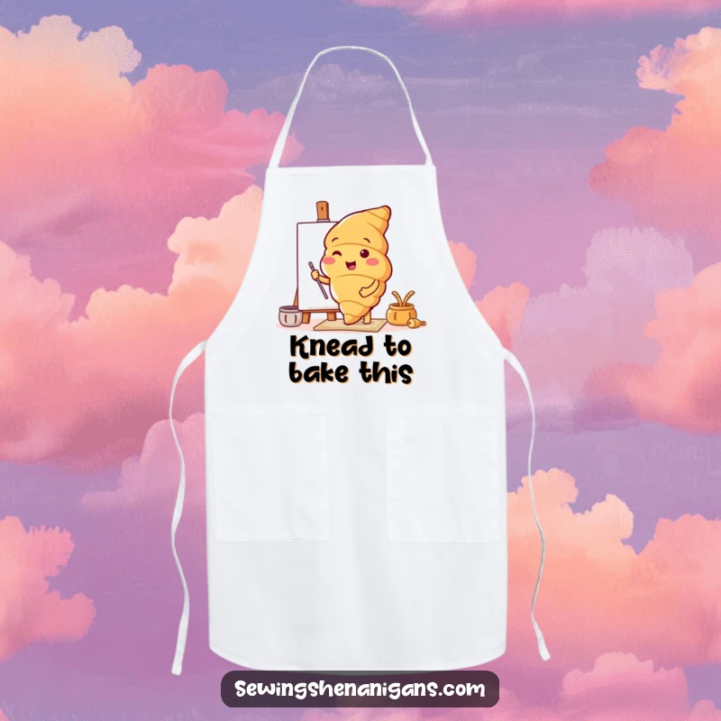 Funny apron with a cheerful croissant character excitedly trying out a new pattern while cooking, adding humor to the kitchen.