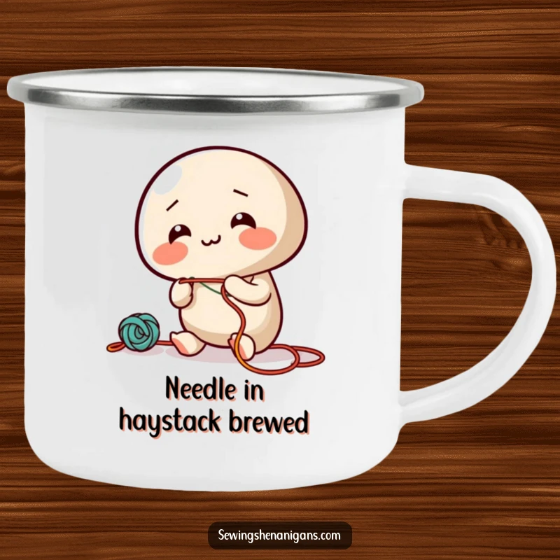 Funny camping mug with a giggling needle character joyfully threading colorful string, perfect for outdoor use.