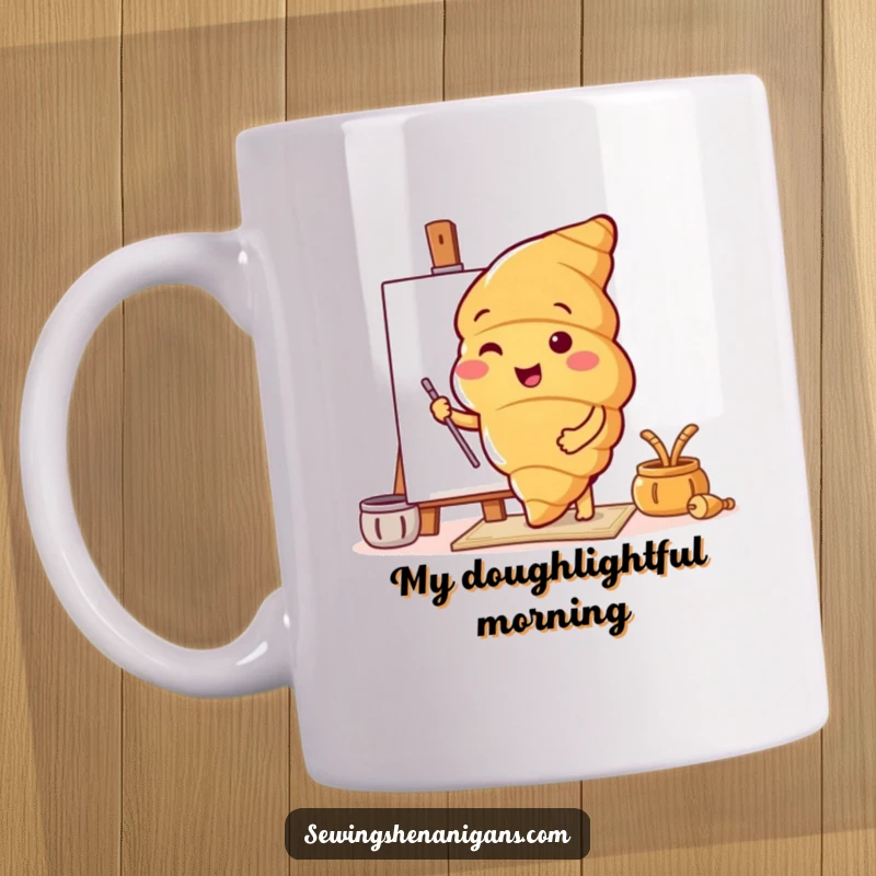 Funny mug with a cheerful croissant character excitedly testing out a colorful new pattern, bringing joy and humor.