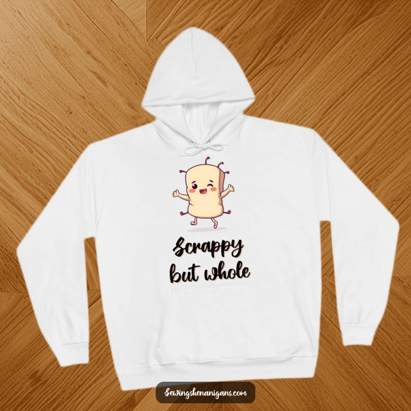 Funny Fabric Scrap Hoodie featuring a determined character doing a joyful jig, designed for comfort and celebrating sewing triumphs.