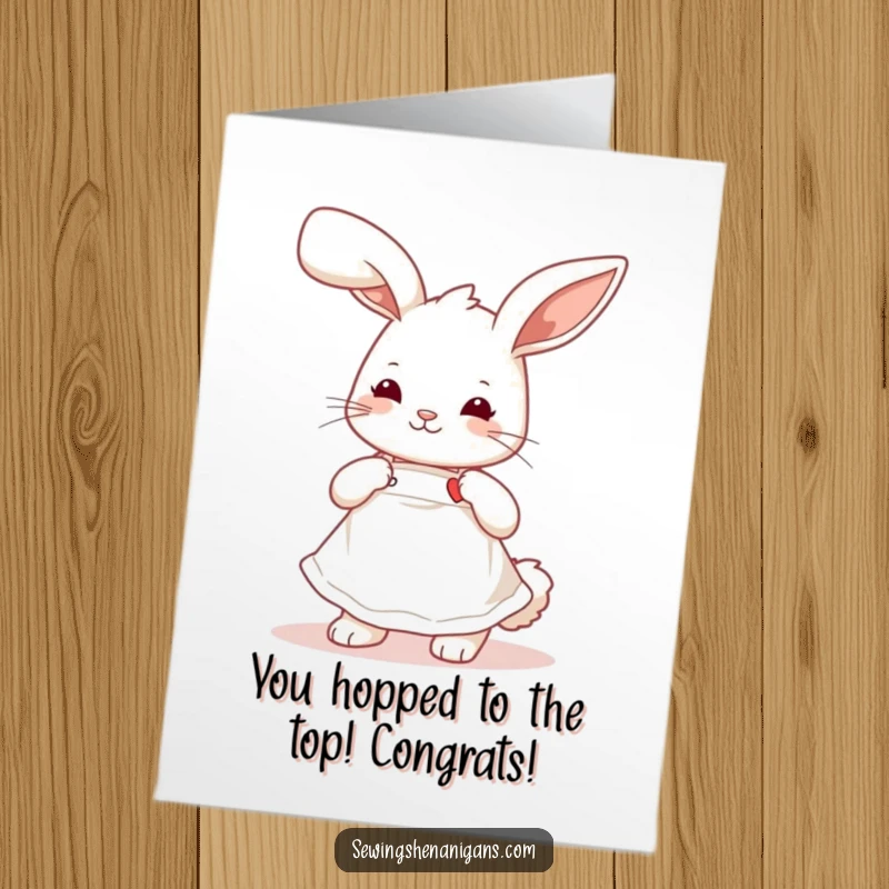 Funny Free Printable Congrats Card: Cute bunny wearing an apron, sewing a small heart, celebrating love and achievement.