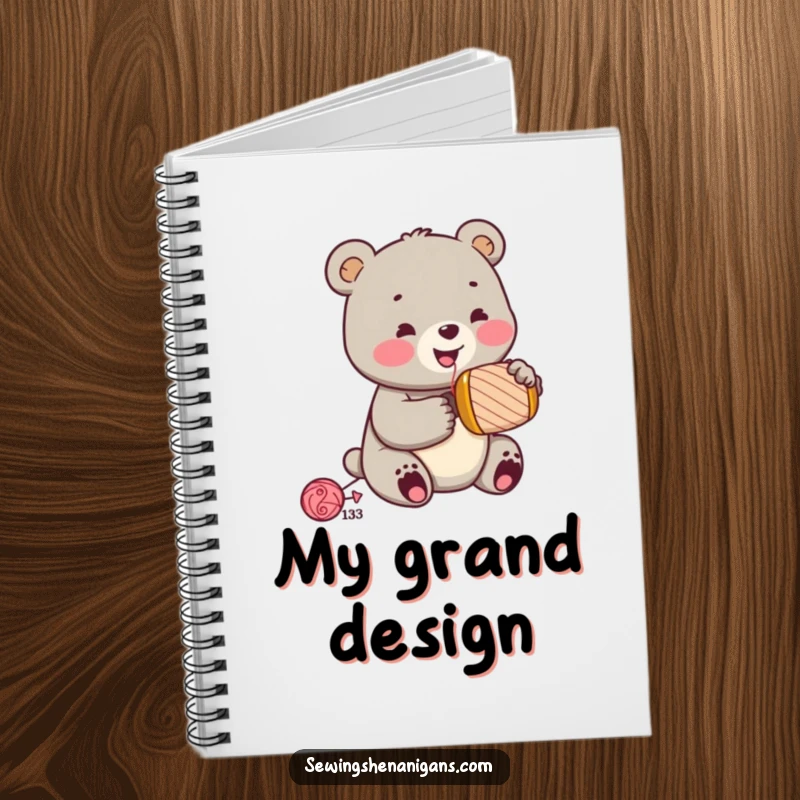 Funny jolly bear cub wearing a sewing thimble, hammering a spool, on a funny notebook cover, ready for project notes, a useful funny gift.