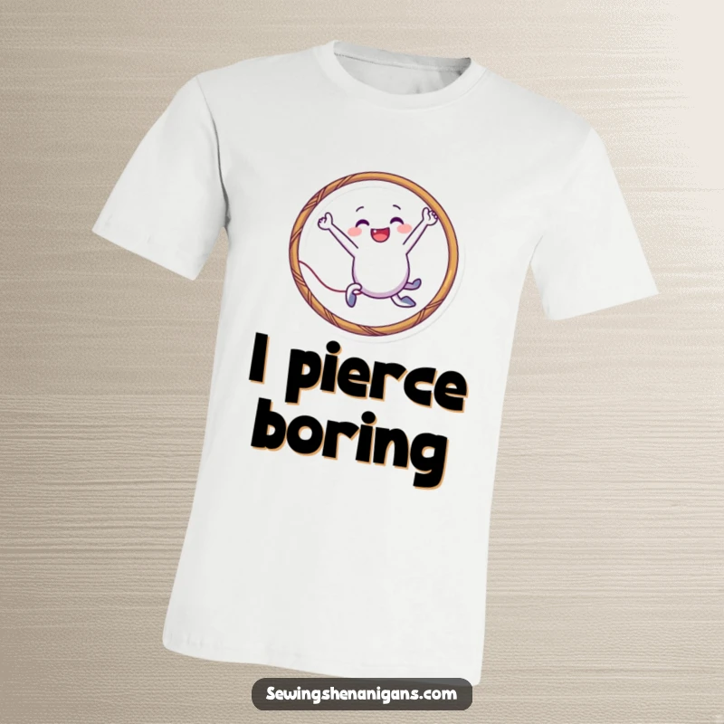 Funny needle character t-shirt leaping through a thread hoop, perfect for playful crafters and as a humorous funny gift.