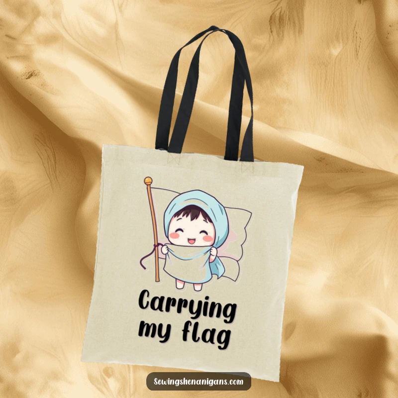 Funny tote bag showing a happy character sewing a smiling face onto a waving flag, perfect for patriotic errands.