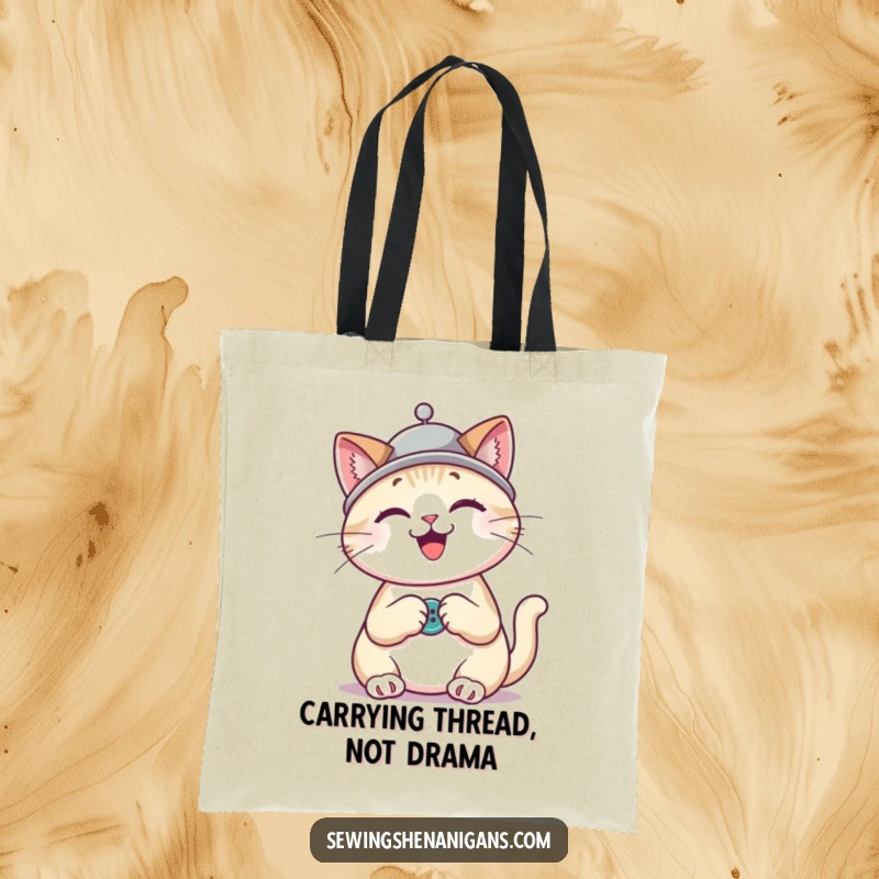 Funny cat wearing a thimble hat sewing a button, a charming and humorous tote bag design for crafters.