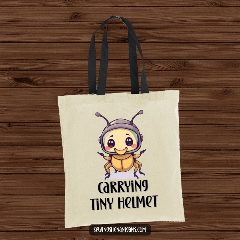 Funny tote bag with a bewildered beetle character sporting a thimble as a helmet, a charming and humorous accessory.